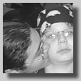 Ruthie & Laura kissing Nathan