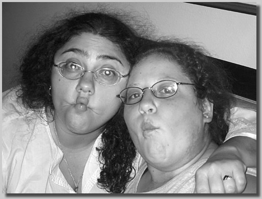 Ruthie and Emma making silly pucker faces