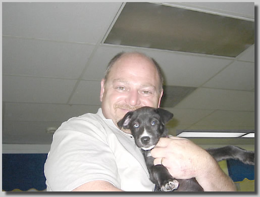 Artie with the new Moskowitz doggie - Sammi at the SPCA before taking her home for adoption
