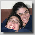 Rooty Jr. and Jonathan being silly on the couch at our house.